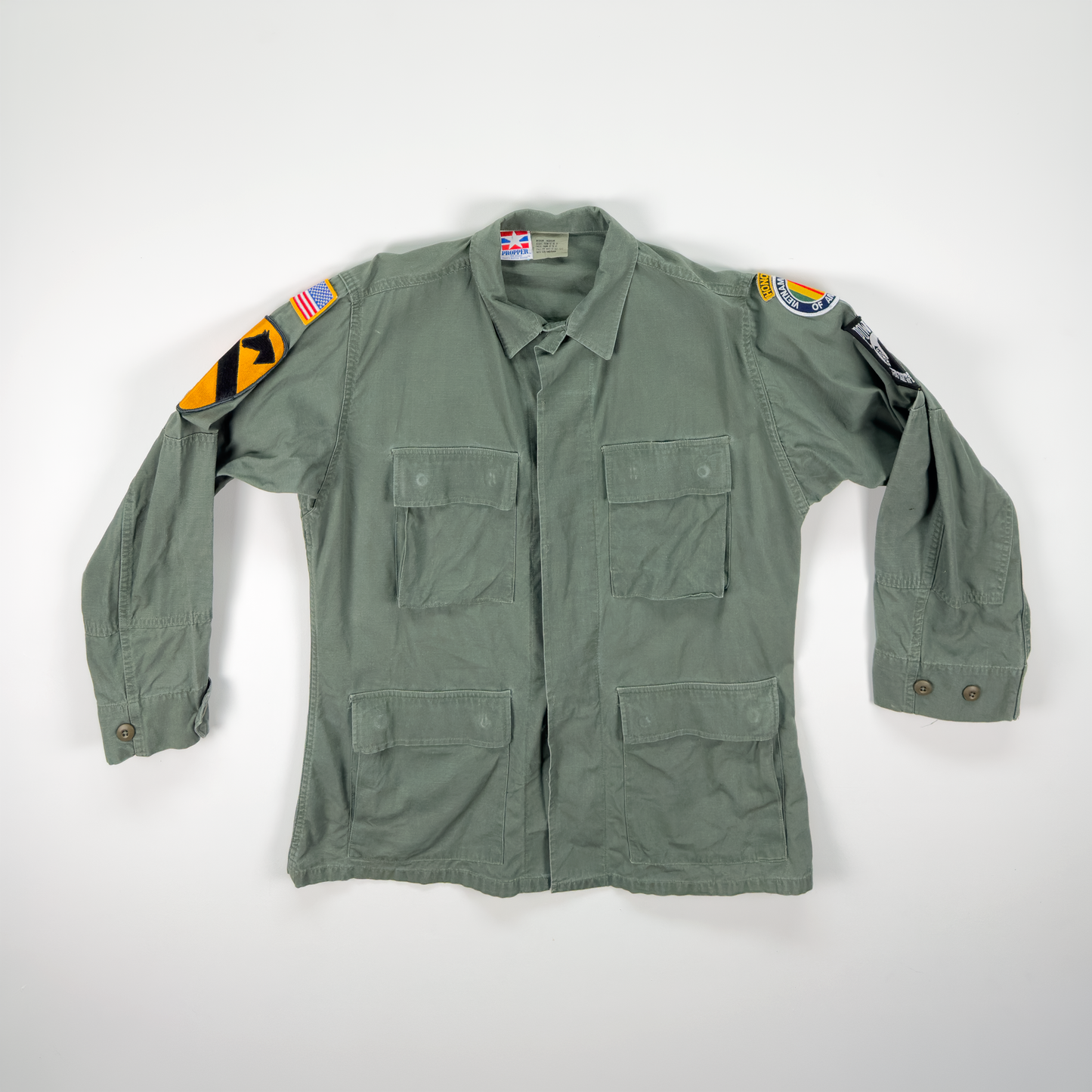 Vietnam War US Army M1967 Jungle Fatigue Shirt — 1st Cavalry, CIB, Purple Heart, E-8